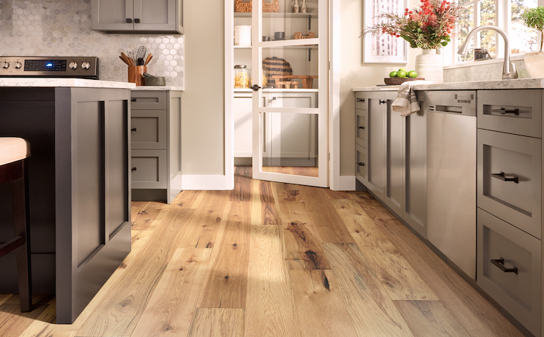warm hardwood flooring in a bright kitchen